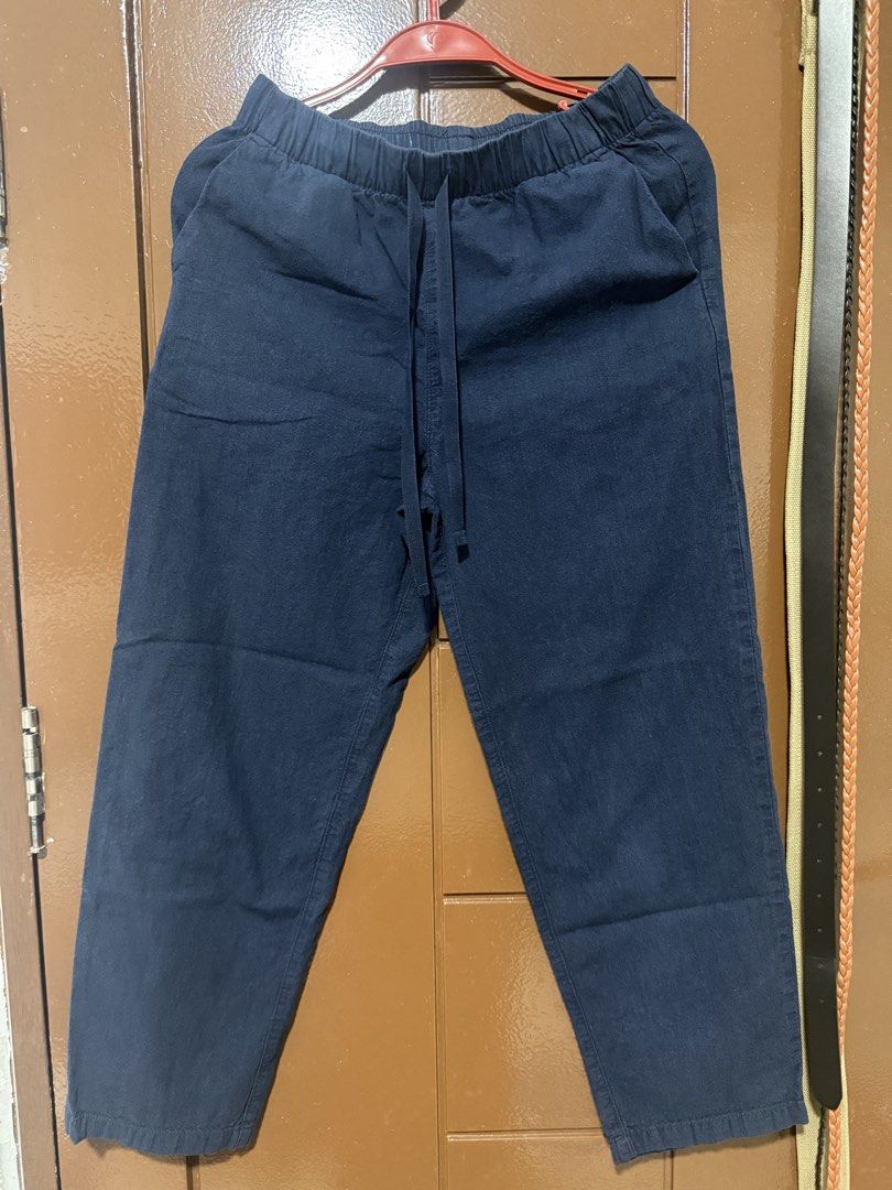 Uniqlo Cotton Pants - Size S (Category: Other Bottoms) located in Makati City. Submitted by naysan (Listing ID 1423661599, Image 1). Description: - Uniqlo cotton pants in navy blue - Size: S - Waist: 60-66 cm - Hips: 85-91 cm - Features: Elastic waistband with drawstring - Two side pockets This is a dark blue Uniqlo cotton pants, very comfy to use..