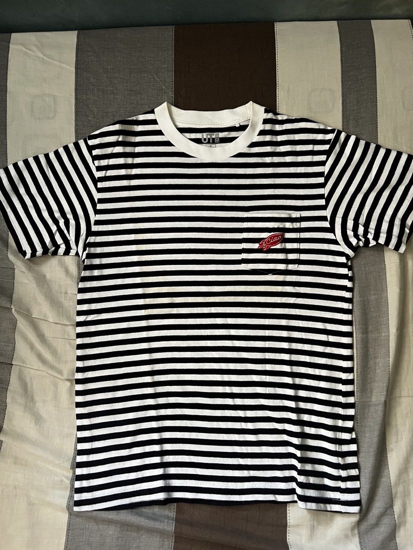 Uniqlo UT Ciao Striped Pocket Tee (Category: Tshirts & Polo Shirts ) located in Pasig City. Submitted by dawgshow (Listing ID 1423625608, Image 1). Description: - Uniqlo UT t-shirt - Classic black and white stripes - White crew neck - Features a small chest pocket with 'Ciao' logo - Standard fit, short sleeves - Made from a lightweight cotton blend - Ideal for everyday casual wear - Condition: Slight discoloration in midpart since due to storage 