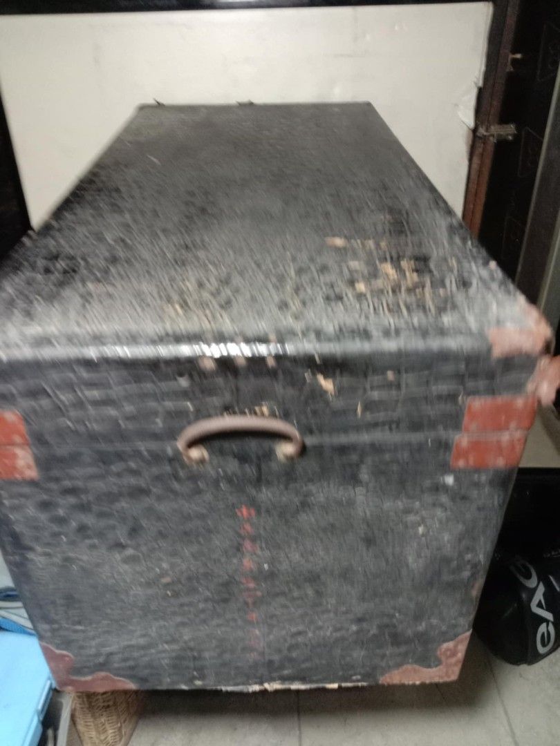 Vintage Black Storage Trunk (Category: Storage Boxes & Baskets) located in Quezon City. Submitted by jpnvintageonline (Listing ID 1423630590, Image 3). Description: - Vintage storage trunk - Black exterior with red corner accents - Patterned design - Latch closure - Blue and white checkered interior - Features Japanese characters and floral emblem -can re purpose as center table -issue cosmetic .