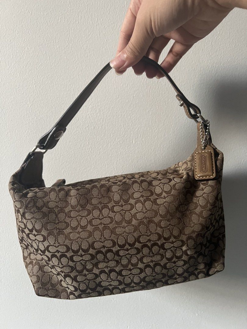 Vintage Coach Mini Brown Bag (C Mini) (Category: Luxury Bags & Wallets) located in Caloocan City. Submitted by jeann_puno08 (Listing ID 1423719119, Image 2). Description: Mint condition. No signs of defects or flaws. .