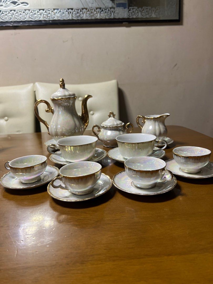 Vintage Pearl Tea Set with Gold Trim (Category: Coffee & Tea Tableware) located in Valenzuela. Submitted by 3ssiastansachajapansurplus (Listing ID 1423717153, Image 1). Description: - Vintage tea set - Pearlescent finish with gold trim - Includes: teapot, sugar bowl, creamer, 6 cups & saucers - Classic design - Perfect for serving or display.