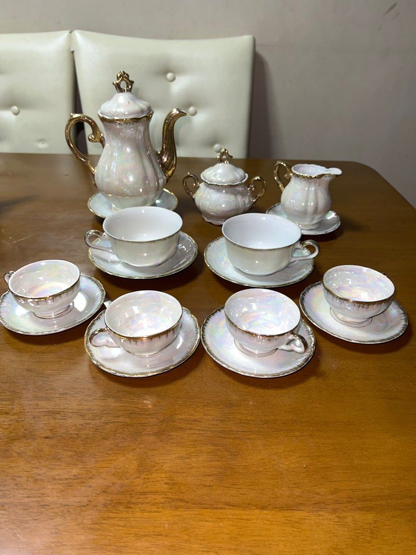 Vintage Pearl Tea Set with Gold Trim (Category: Coffee & Tea Tableware) located in Valenzuela. Submitted by 3ssiastansachajapansurplus (Listing ID 1423717153, Image 3). Description: - Vintage tea set - Pearlescent finish with gold trim - Includes: teapot, sugar bowl, creamer, 6 cups & saucers - Classic design - Perfect for serving or display.