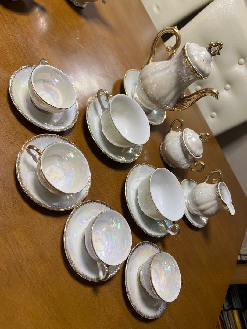 Vintage Pearl Tea Set with Gold Trim (Category: Coffee & Tea Tableware) located in Valenzuela. Submitted by 3ssiastansachajapansurplus (Listing ID 1423717153, Image 2). Description: - Vintage tea set - Pearlescent finish with gold trim - Includes: teapot, sugar bowl, creamer, 6 cups & saucers - Classic design - Perfect for serving or display.