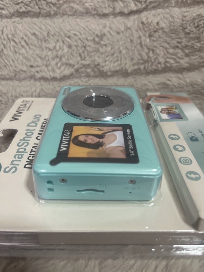 Vivitar Snapshot Duo Digital Camera (Category: Cameras) located in Pasig City. Submitted by jundbaptist21 (Listing ID 1423689627, Image 3). Description: Vivitar Snapshot Duo Digital Camera features a 1.4" selfie screen and a 2.4" back color screen. It has 56 Megapixels, 16x zoom, and 2.7K resolution. It includes a self-timer, continuous shooting, a built-in rechargeable battery, a USB-C charging port, and a micro SD card slot (up to 64GB). FROM U