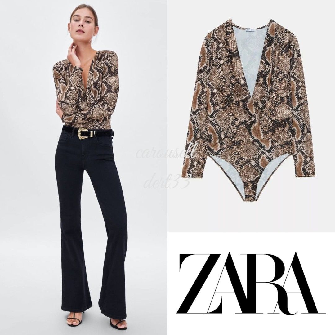 🇺🇸Zara Snake Print Bodysuit (Category: Others Tops) located in Baguio. Submitted by dert33 (Listing ID 1423764172, Image 1). Description: - Zara snake print bodysuit - Plunging V-neck - Long sleeves - Form-fitting design - Stretchy material - Dress it up or down - Chic and stylish.