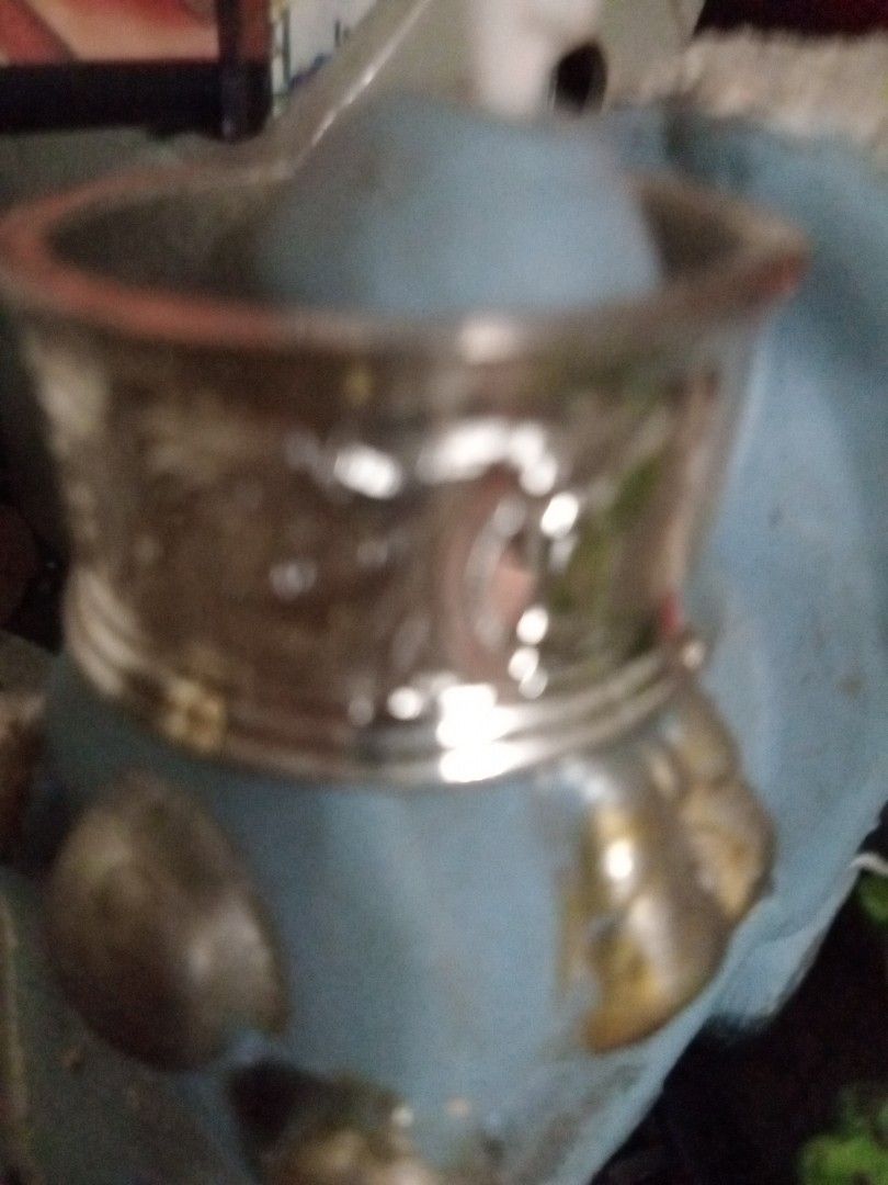 1902 Silver Napkin Ring with Floral Design (Category: Coffee & Tea Tableware) located in Manila. Submitted by padillahe35291 (Listing ID 1423939905, Image 2). Description: - Silver napkin ring - Features a floral design - Made of shiny metal - Smooth finish - Suitable for daily wear or special occasions.