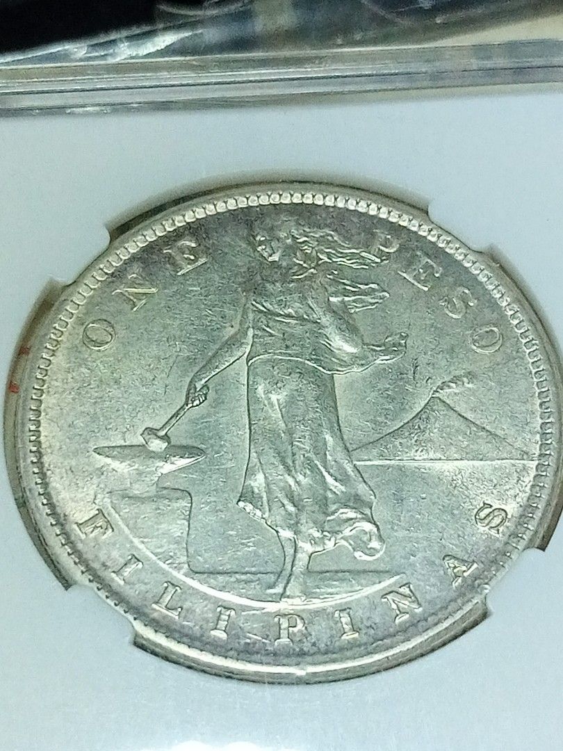 1908 S US Philippines One Peso Coin Silver (Category: Currency) located in Silang. Submitted by pickright (Listing ID 1423924146, Image 2). Description: - 1908 S US Philippines One Peso Coin - with luster - Includes slab casing.