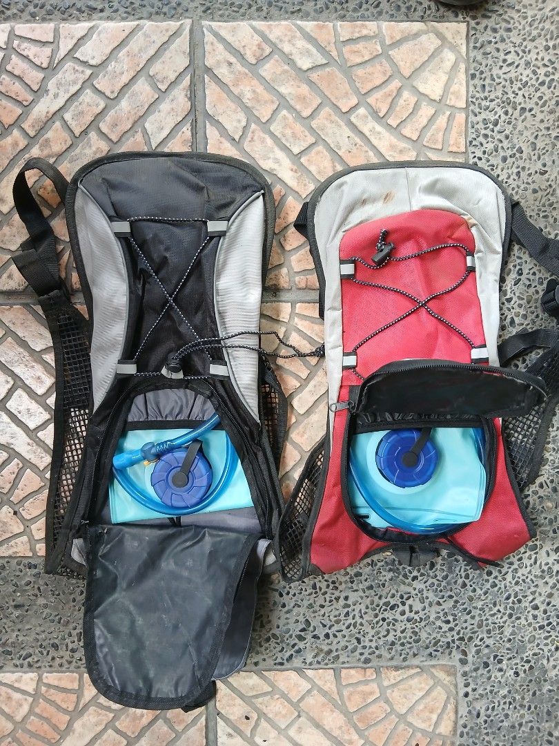 Hydration Backpack (Category: Backpacks) located in Dasmarinas. Submitted by tataysgarage (Listing ID 1423924690, Image 3). Description: Buy 1 take 1 !!!! Stocked in storaged room - hydration backpack for outdoor activities. - Includes hydration bladder. - Features adjustable straps for a comfortable fit. - Breathable back panel for enhanced comfort. - Multiple pockets for storing essentials. - Available colors: Black and Red..