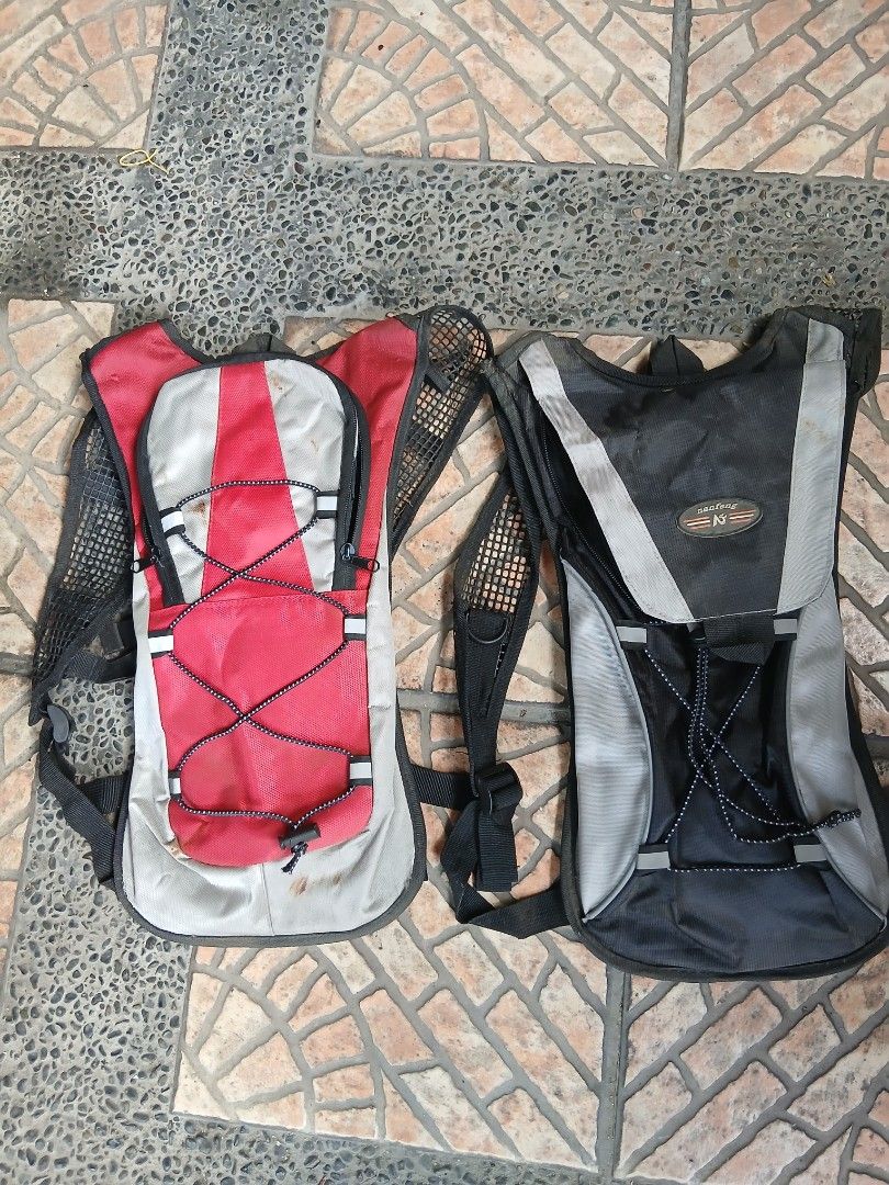Hydration Backpack (Category: Backpacks) located in Dasmarinas. Submitted by tataysgarage (Listing ID 1423924690, Image 1). Description: Buy 1 take 1 !!!! Stocked in storaged room - hydration backpack for outdoor activities. - Includes hydration bladder. - Features adjustable straps for a comfortable fit. - Breathable back panel for enhanced comfort. - Multiple pockets for storing essentials. - Available colors: Black and Red..