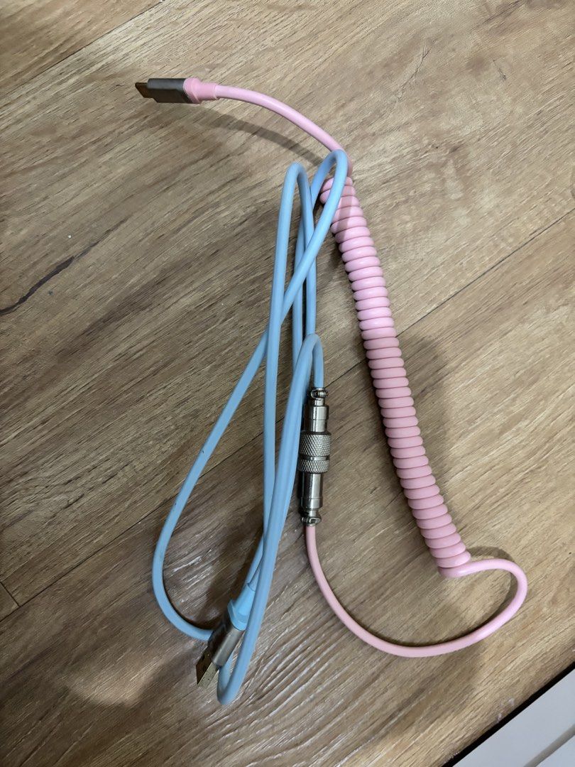 Akko Custom Coiled Keyboard Cable (Cotton Candy) (Category: Computer Keyboard) located in Pasig City. Submitted by trubish_collectibles (Listing ID 1423929135, Image 1). Description: - Pink and blue design (Cotton Candy) - AKKO - USB-A to USB-C - For mechanical keyboards - Good working condition *KEEP IN MIND* - Buyer always pays first before receiving the product! - Only mode of transportation is Lalamove! (Unable to meet up because of personal 