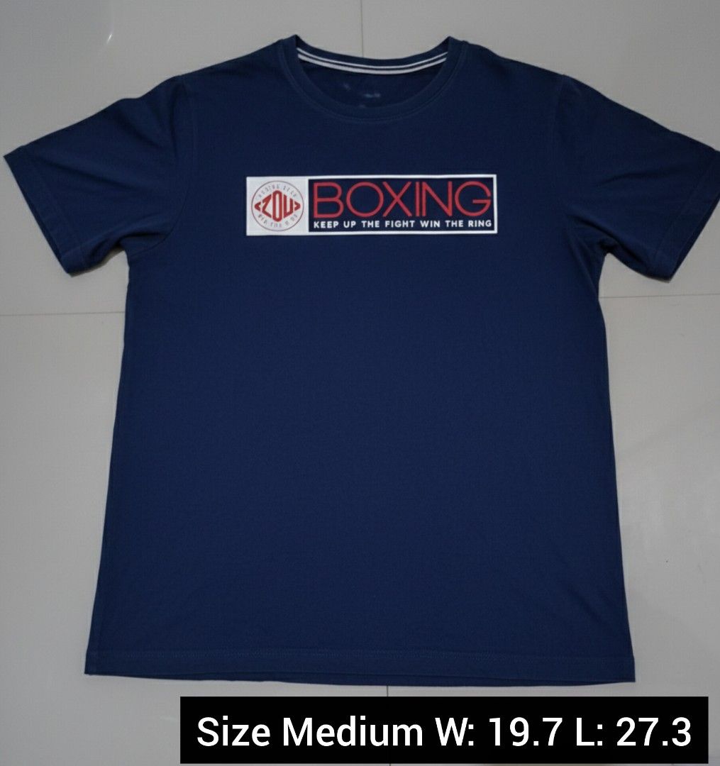 ANTA Boxing Graphic T-Shirt - Medium (Category: Tshirts & Polo Shirts ) located in Bulacan. Submitted by jpdomingo27 (Listing ID 1423935297, Image 1). Description: - ANTA t-shirt - Features a boxing graphic - Red "BOXING" text and "KEEP UP THE FIGHT WIN THE RING" - Size: Medium - Width: 19.7 inches - Length: 27.3 inches Price: 150 Only ✅️ Location Pandi Bulacan Or Shipping J&T Express Pm lang po 📩.