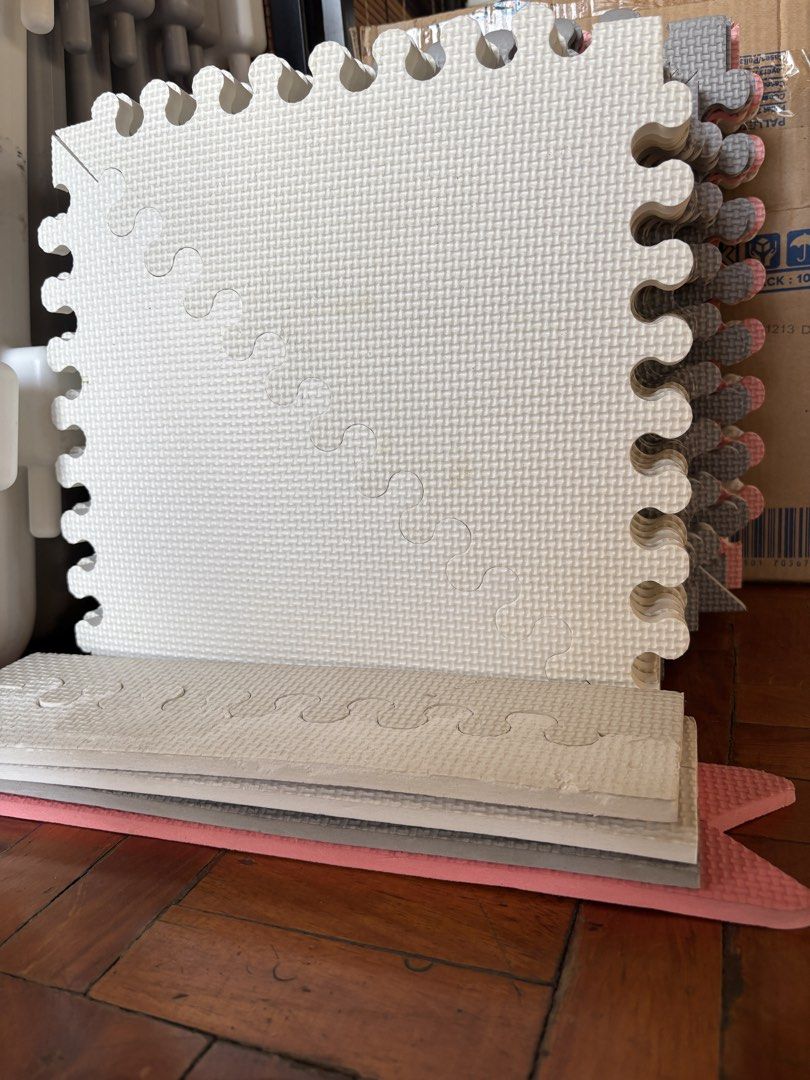 Assorted Playmats (Category: Infant Playtime) located in Paranaque City. Submitted by elainegrace22 (Listing ID 1423901228, Image 3). Description: 12 pcs thick 12x12” white / gray tile (squares) 8 pcs thin 14x14” white / pink tile (squares) - Interlocking foam play mat set. - Colors: White, gray, and pink. - Cushioned play area for babies and toddlers. - Puzzle-like edges for easy assembly. - Easy to clean and store..