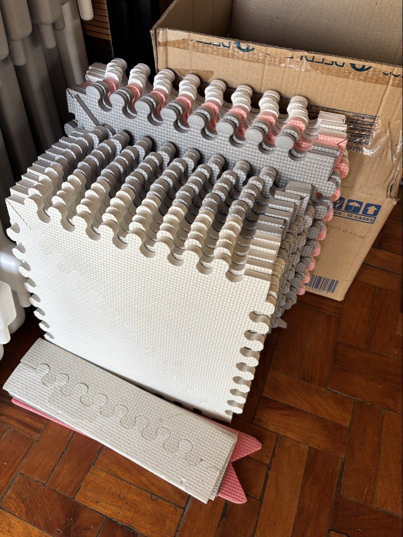 Assorted Playmats (Category: Infant Playtime) located in Paranaque City. Submitted by elainegrace22 (Listing ID 1423901228, Image 1). Description: 12 pcs thick 12x12” white / gray tile (squares) 8 pcs thin 14x14” white / pink tile (squares) - Interlocking foam play mat set. - Colors: White, gray, and pink. - Cushioned play area for babies and toddlers. - Puzzle-like edges for easy assembly. - Easy to clean and store..