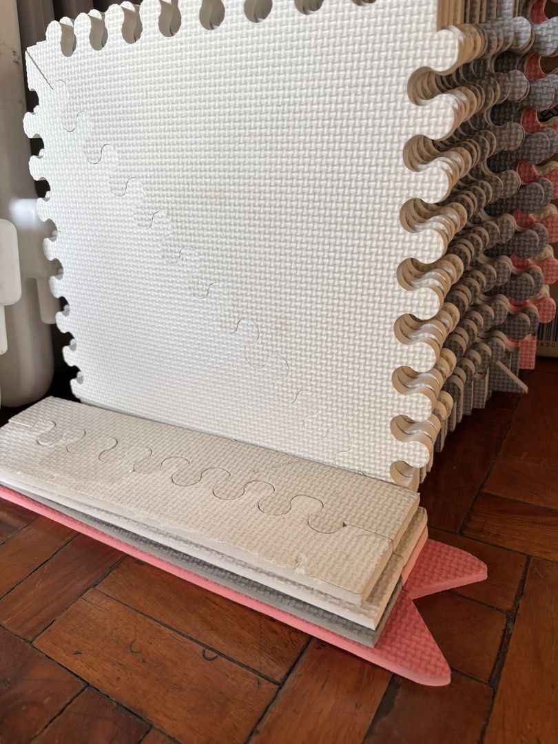 Assorted Playmats (Category: Infant Playtime) located in Paranaque City. Submitted by elainegrace22 (Listing ID 1423901228, Image 2). Description: 12 pcs thick 12x12” white / gray tile (squares) 8 pcs thin 14x14” white / pink tile (squares) - Interlocking foam play mat set. - Colors: White, gray, and pink. - Cushioned play area for babies and toddlers. - Puzzle-like edges for easy assembly. - Easy to clean and store..