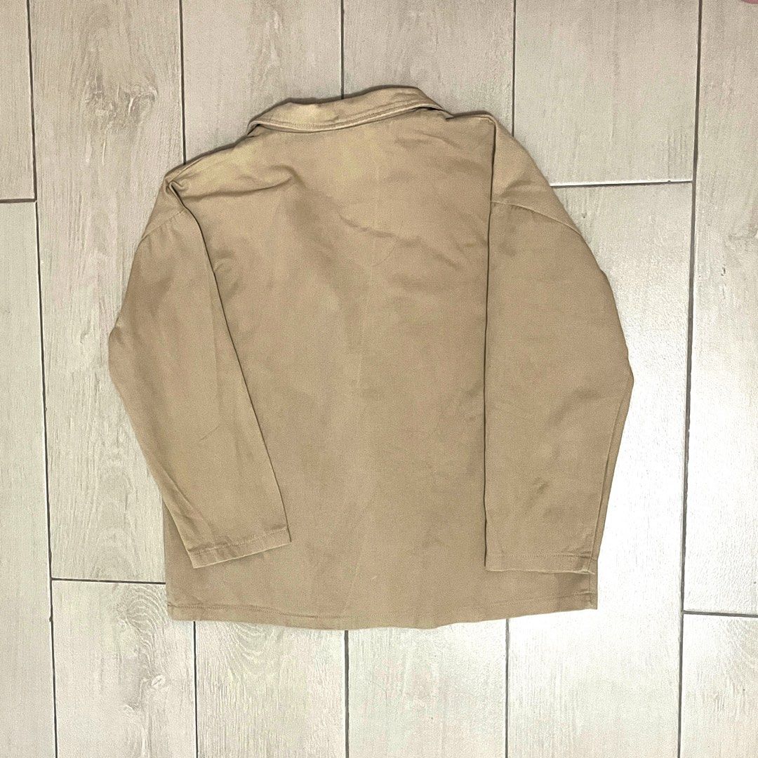 Beige Blazer with Pockets (Category: Coats, Jackets and Outerwear) located in Makati City. Submitted by sixelaa (Listing ID 1423842356, Image 2). Description: - Beige blazer - Single button closure - Two front pockets - Classic lapel collar - Long sleeves - Soft, possibly linen-like fabric - Relaxed fit - Versatile neutral color - Ideal for layering.