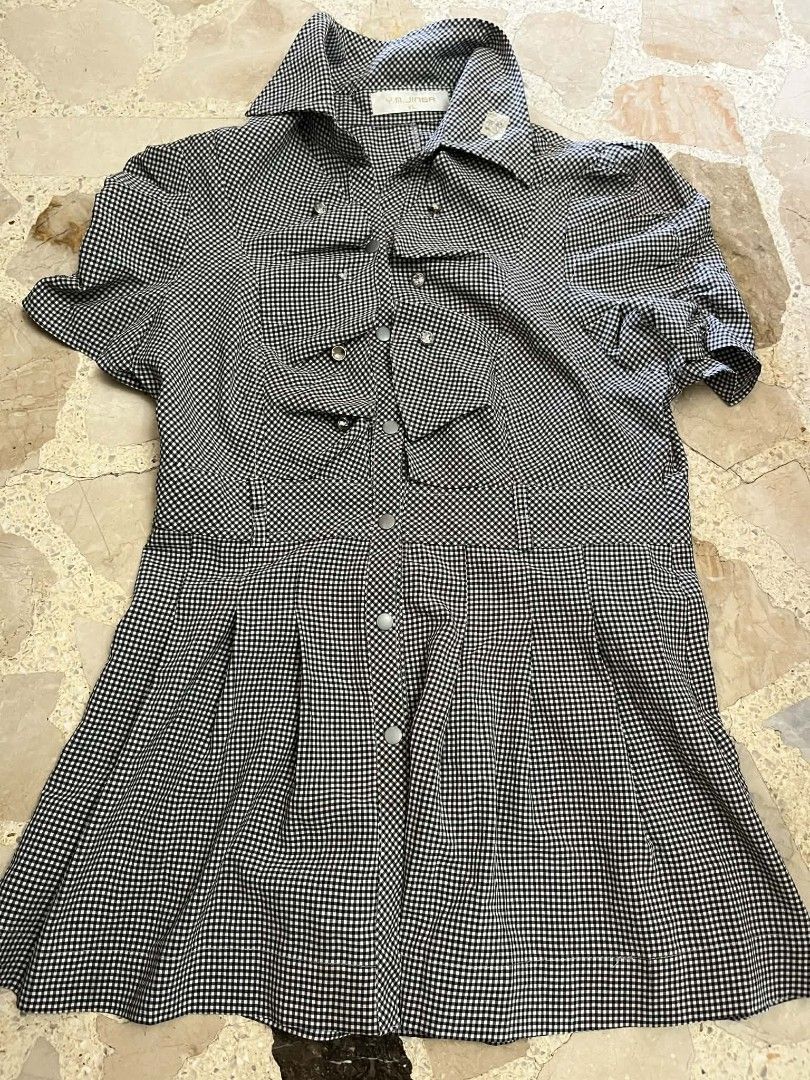 Black Vintage Houndstooth Dress (Category: Dresses) located in San Pablo. Submitted by ellecsc (Listing ID 1423834662, Image 1). Description: - Vintage houndstooth dress - Short sleeves - Collared neckline - Button-down front - Chest pockets - Pleated skirt - Lightweight fabric - perfect for warm weather!.
