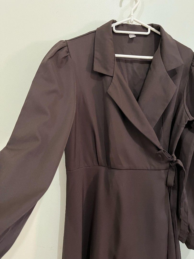 Brown Wrap Dress (Category: Dresses) located in Quezon City. Submitted by jarsonjae (Listing ID 1423851985, Image 2). Description: - Brown wrap dress - Long sleeves with puff shoulders - Tie closure at waist - Collared neckline - Flattering A-line skirt - Great for casual and semi-formal events.