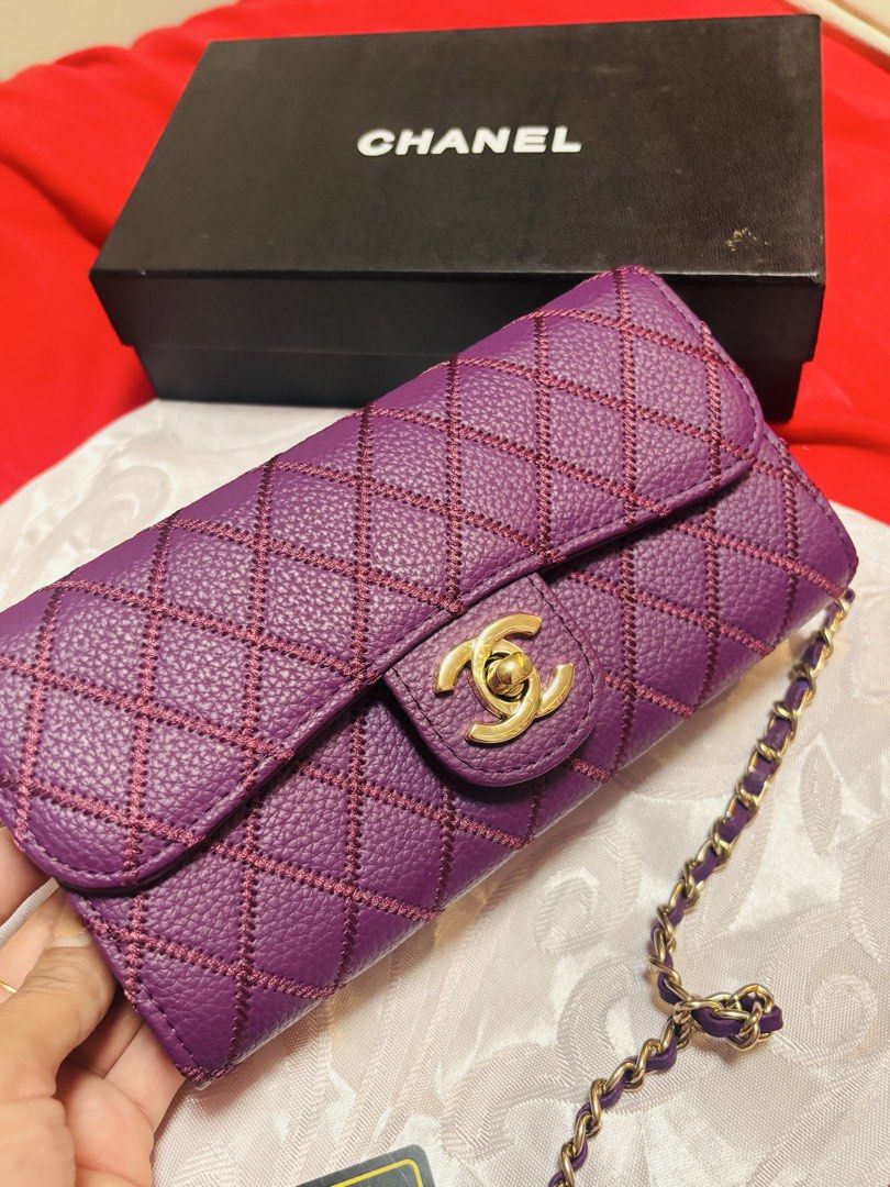 Chanel Wallet on Chain Purple (Category: Luxury Bags & Wallets) located in Cebu City. Submitted by day.98 (Listing ID 1423898859, Image 2). Description: - Selected from japan surplus - Vibrant purple color - Quilted design - Gold chain strap - Signature CC clasp - Multiple interior compartments - Zippered pocket - Includes original box - Includes authenticity card - Includes care booklet - Made in Italy.