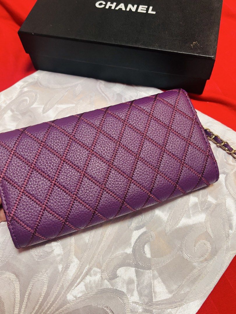 Chanel Wallet on Chain Purple (Category: Luxury Bags & Wallets) located in Cebu City. Submitted by day.98 (Listing ID 1423898859, Image 3). Description: - Selected from japan surplus - Vibrant purple color - Quilted design - Gold chain strap - Signature CC clasp - Multiple interior compartments - Zippered pocket - Includes original box - Includes authenticity card - Includes care booklet - Made in Italy.