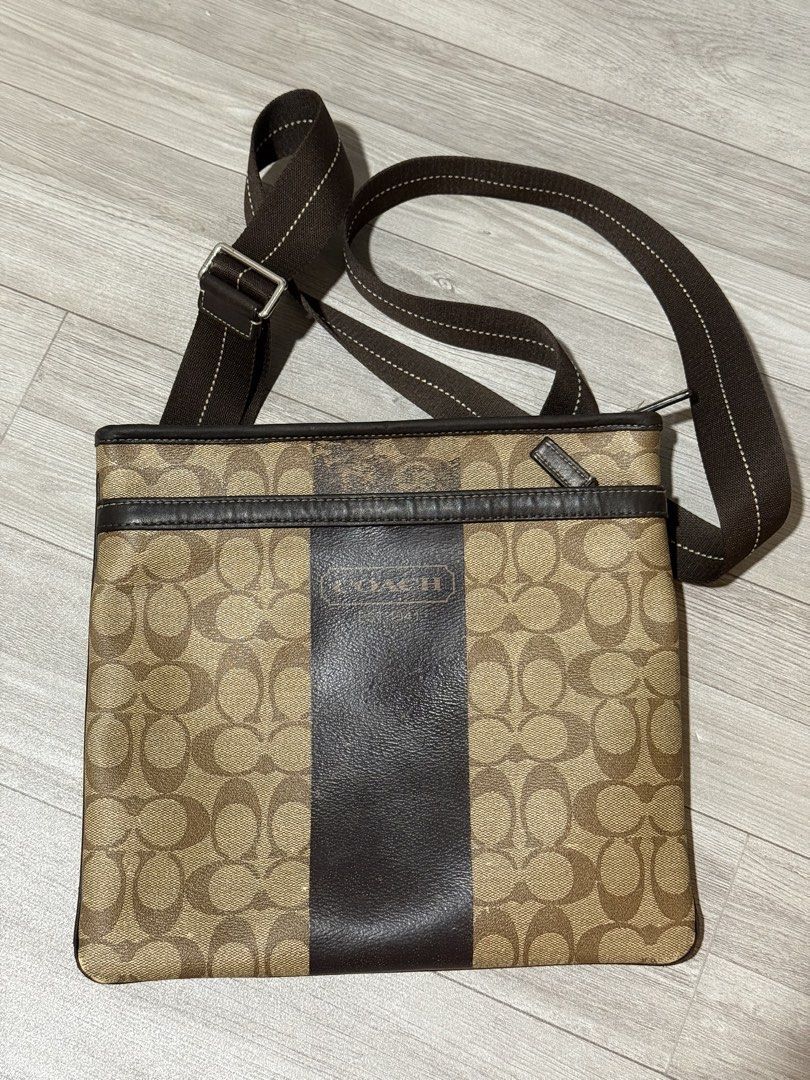 Coach Signature Crossbody Bag (Category: Luxury Bags & Wallets) located in Makati City. Submitted by alonfinds (Listing ID 1423942151, Image 3). Description: - Heritage Stripe Slim Shoulder Bag or Heritage Signature Small Zip Top Crossbody. - Model Number F70591. - Signature PVC coated canvas with leather accents and silver-tone hardware. .