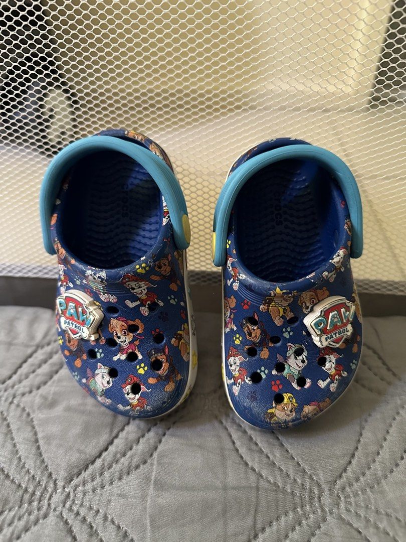 Crocs Paw Patrol Clogs Size 6 (Category: Babies & Kids Fashion) located in Bulacan. Submitted by dyna01 (Listing ID 1423848304, Image 2). Description: - Paw Patrol Crocs clogs - Size 6 - Navy blue with light blue accents - White sole - Paw Patrol logo on side - Some wear on soles - Adjustable strap.