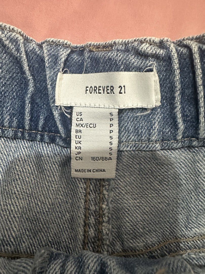 Forever 21 Denim Shorts - Size S (Category: Shorts) located in Antipolo. Submitted by decluttertosave (Listing ID 1423837836, Image 3). Description: - Forever 21 denim shorts - Size: S - Features: - Light blue wash - Drawstring waist - Front pockets - Measurements (approximate): - Waist: 13 inches (laid flat) - Length: 16 inches.