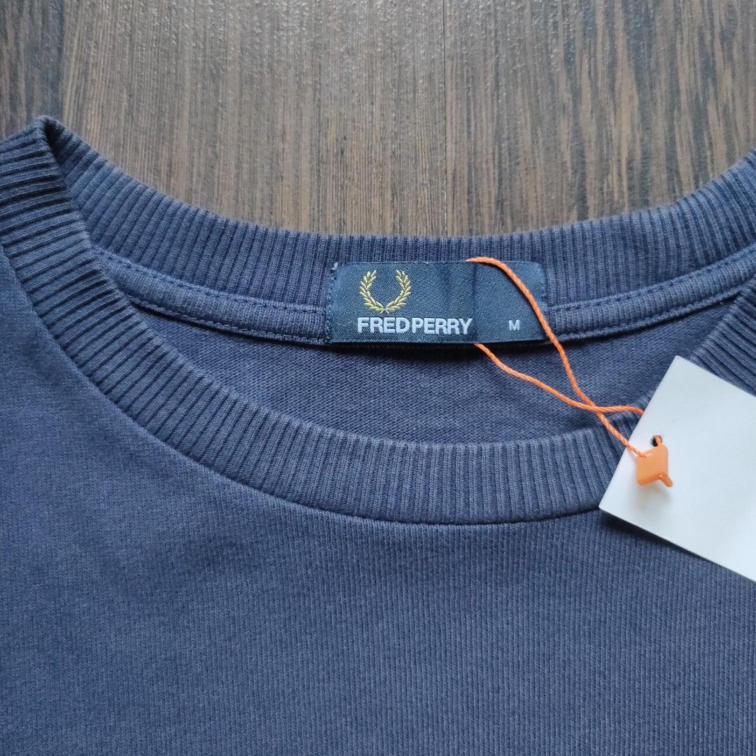 FRED PERRY | Men's Circular Embroidered Logo Shirt (Category: Tshirts & Polo Shirts ) located in Cebu City. Submitted by denimholic (Listing ID 1423795052, Image 2). Description: 🔖FRED PERRY Preloved Men's Tshirt ▫️Embroidered Logo, Navy Blue ▫️MEDIUM on tag, Loose Box Fit ▫️9.0 | 10 very good condition **color may varies (pic taken natural light).