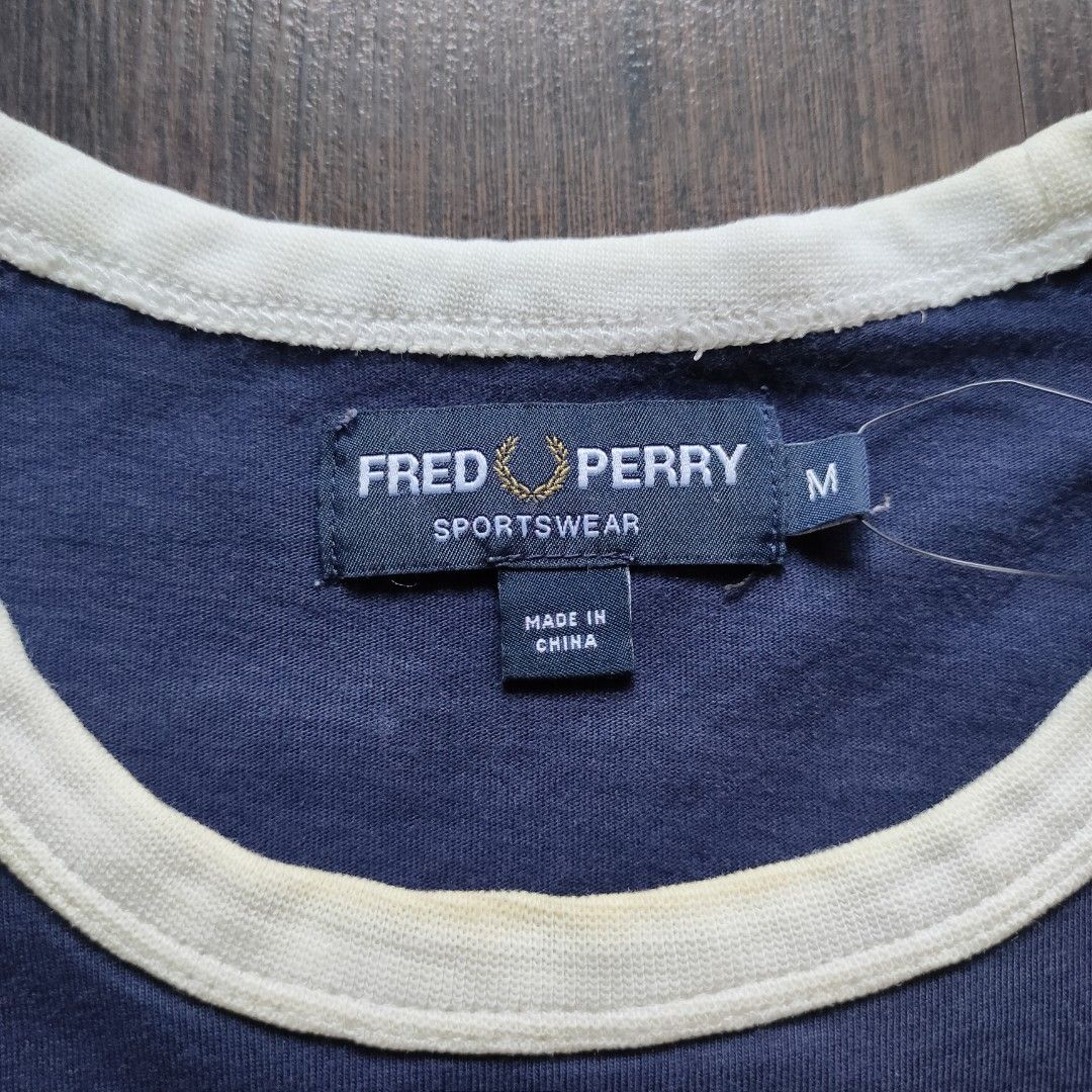 FRED PERRY | Ringer Taped Logo Shirt - Navy Blue (Category: Tshirts & Polo Shirts ) located in Cebu City. Submitted by denimholic (Listing ID 1423795085, Image 2). Description: 🔖FRED PERRY Preloved Men's Tshirt ▫️Ringer Logo Taped, Navy Blue ▫️MEDIUM on tag, Slim Fit ▫️9.0 | 10 excellent condition **color may varies (pic taken natural light).
