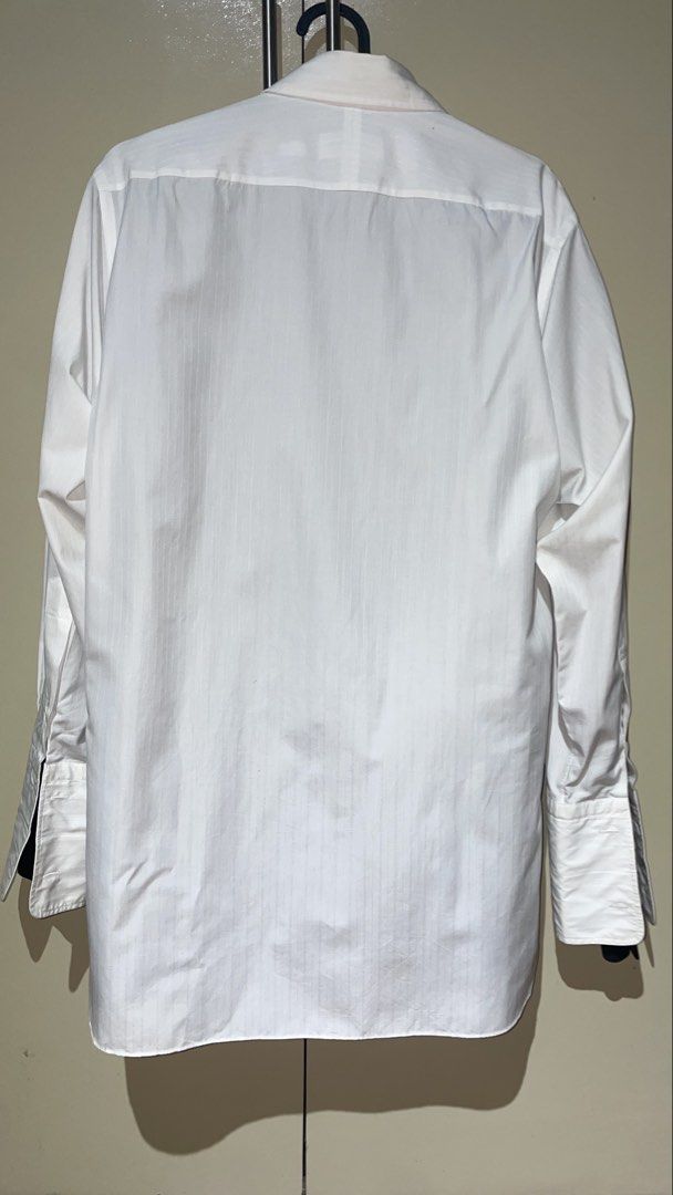Givenchy Monsieur White Polo (Category: Luxury Apparel) located in Pasig City. Submitted by xtiansa (Listing ID 1423953825, Image 2). Description: Authentic .