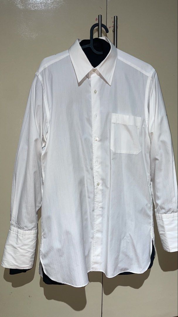 Givenchy Monsieur White Polo (Category: Luxury Apparel) located in Pasig City. Submitted by xtiansa (Listing ID 1423953825, Image 1). Description: Authentic .