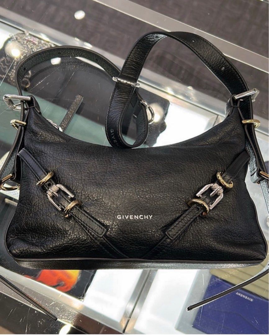 Givenchy Voyou Bag (Category: Luxury Bags & Wallets) located in Quezon City. Submitted by bagexpressph (Listing ID 1423924281, Image 3). Description: - Authentic Givenchy hobo bag - Black leather - Silver and gold hardware - Shoulder strap - Features buckle details - Includes dust bag and tag - Layaway w/o Surcharge .