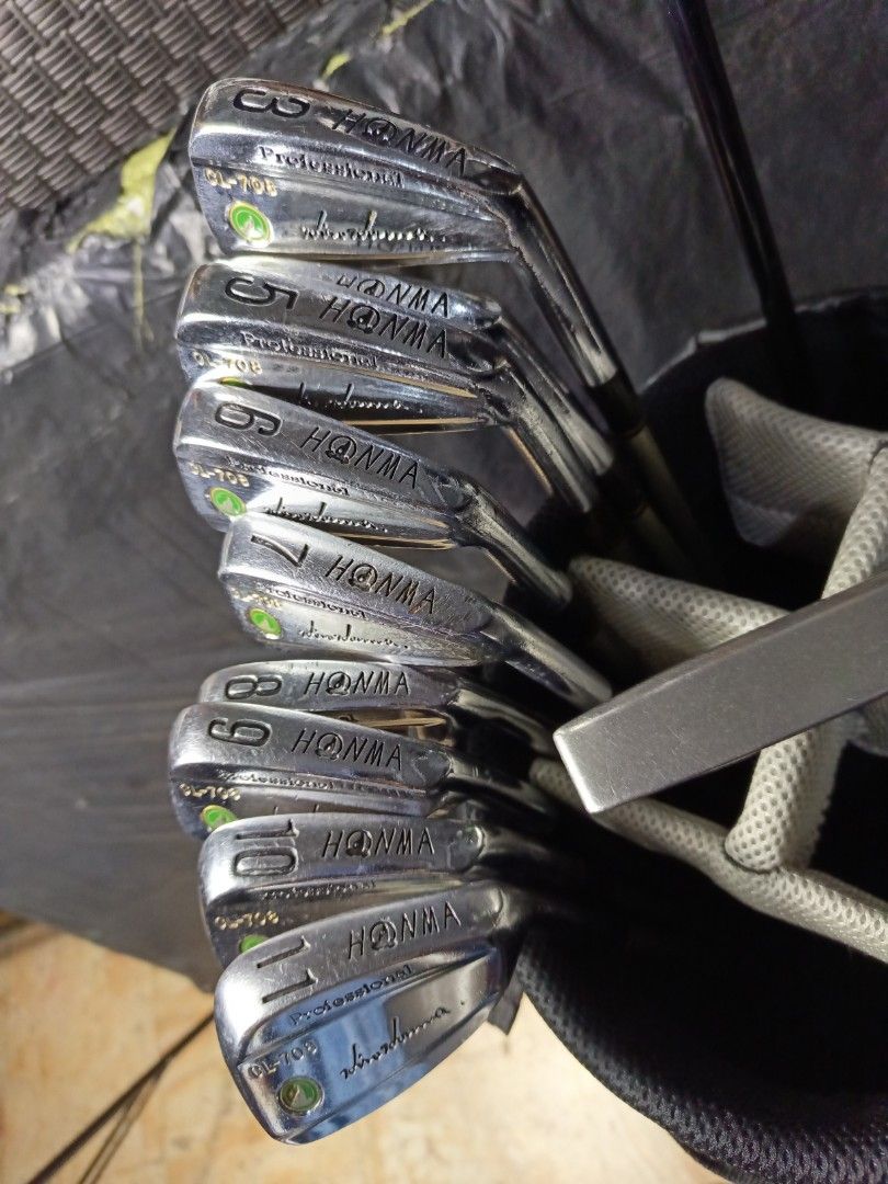 GOLF SET (Category: Golf) located in Manila. Submitted by yeonmei5614747 (Listing ID 1423806178, Image 3). Description: Complete golf club set including Honma CL-708 irons (3-11), TaylorMade r540 driver, XXIO 4 wood, Ping Putter and Snake Eyes golf bag. Includes a putter and a hybrid club. The bag is black with the Snake Eyes logo and an American flag patch. -Honma Boron S-2 Shaft -Right Handed Club. -Graphite Shaft.. -R flex.. #10 & #11 iron is 