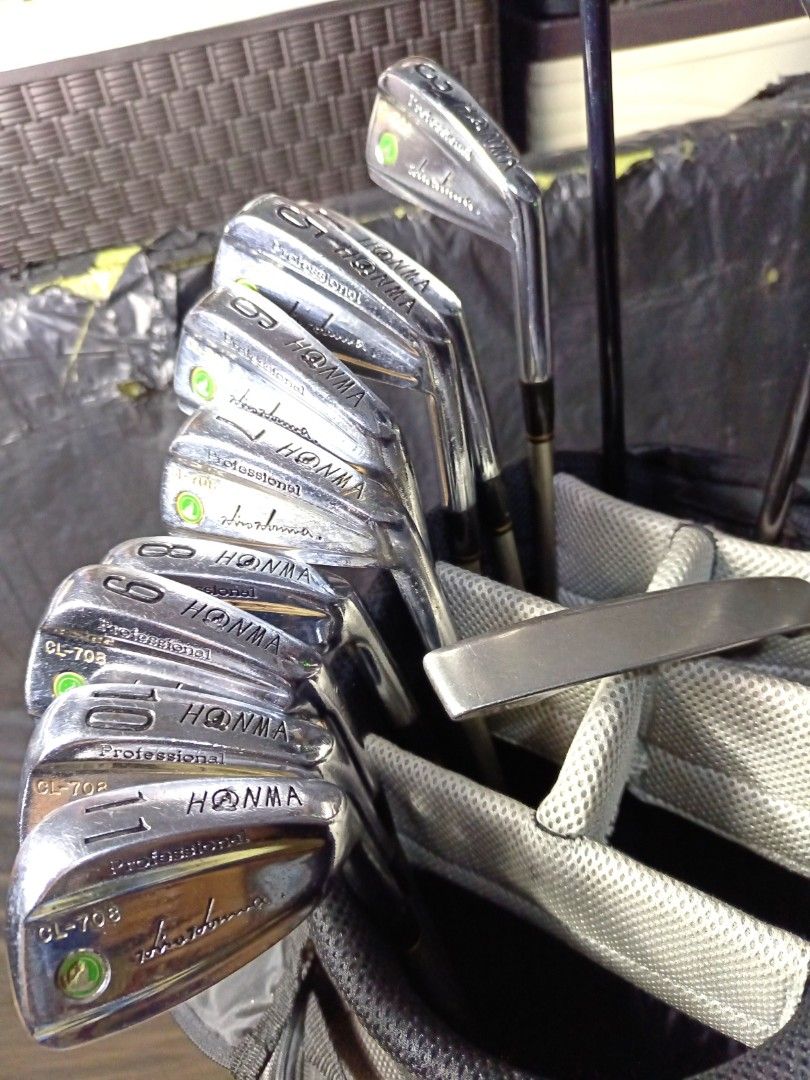 GOLF SET (Category: Golf) located in Manila. Submitted by yeonmei5614747 (Listing ID 1423806178, Image 2). Description: Complete golf club set including Honma CL-708 irons (3-11), TaylorMade r540 driver, XXIO 4 wood, Ping Putter and Snake Eyes golf bag. Includes a putter and a hybrid club. The bag is black with the Snake Eyes logo and an American flag patch. -Honma Boron S-2 Shaft -Right Handed Club. -Graphite Shaft.. -R flex.. #10 & #11 iron is 