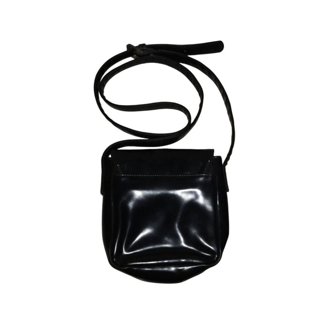 Guess Patent Leather Mini Sling Bag (Black) (Category: Luxury Accessories) located in General Mariano Alvarez. Submitted by hundred_lives (Listing ID 1423945270, Image 3). Description: Guess Patent Leather Mini Sling Bag (Black) ***Or Best Offer Wins*** Tags: burberry fendi mcm givenchy yohji yamamoto rick owens prada dolce & gabbana channel gucci hermès balenciaga valentino ralph lauren lacoste ysl bottega veneta givenchy bally y3 maison margiel