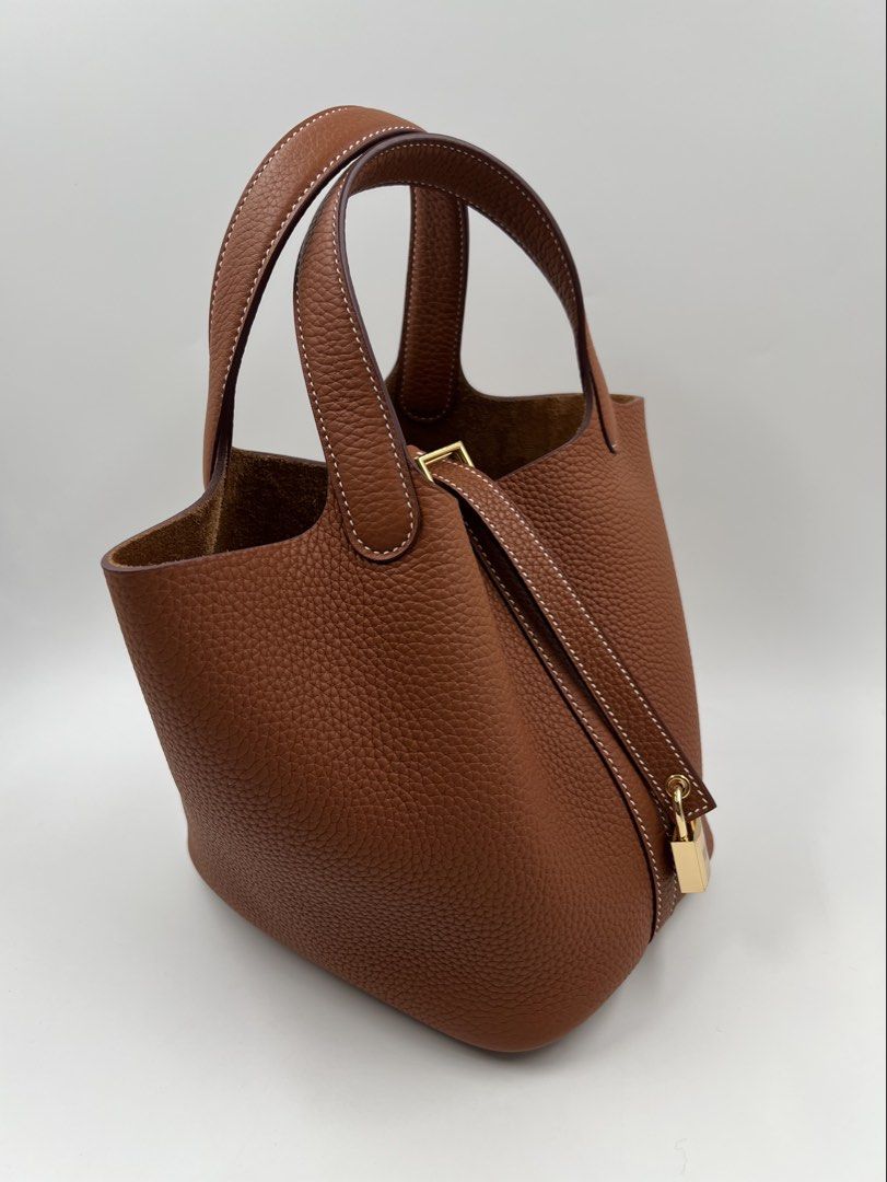 ⚜️Hermes Picotin 18 Handbag (Category: Luxury Bags & Wallets) located in Makati City. Submitted by 90sangel (Listing ID 1423926803, Image 3). Description: • Item: Hermes Picotin Gold Taurillon Clemence Leather •Size: 18 •Condition: Excellent! Rank SA *Wonderfully crafted from Gold Taurillon Clemence leather, this Hermes Picotin Lock 18 is a creation for those who love a blend of luxury and style ~ *This include original box dustbag, cards. Rush /