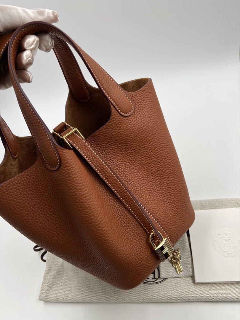 ⚜️Hermes Picotin 18 Handbag (Category: Luxury Bags & Wallets) located in Makati City. Submitted by 90sangel (Listing ID 1423926803, Image 2). Description: • Item: Hermes Picotin Gold Taurillon Clemence Leather •Size: 18 •Condition: Excellent! Rank SA *Wonderfully crafted from Gold Taurillon Clemence leather, this Hermes Picotin Lock 18 is a creation for those who love a blend of luxury and style ~ *This include original box dustbag, cards. Rush /