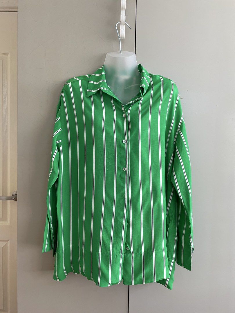H&M Green Striped Shirt (Category: Shirts) located in Paranaque City. Submitted by beamiscellaneous (Listing ID 1423852335, Image 1). Description: H&M striped shirt. EUR S/US S/CN 160/88A. Collared, long sleeves, button-down. Lightweight. Worn twice. RFS: decluttering.