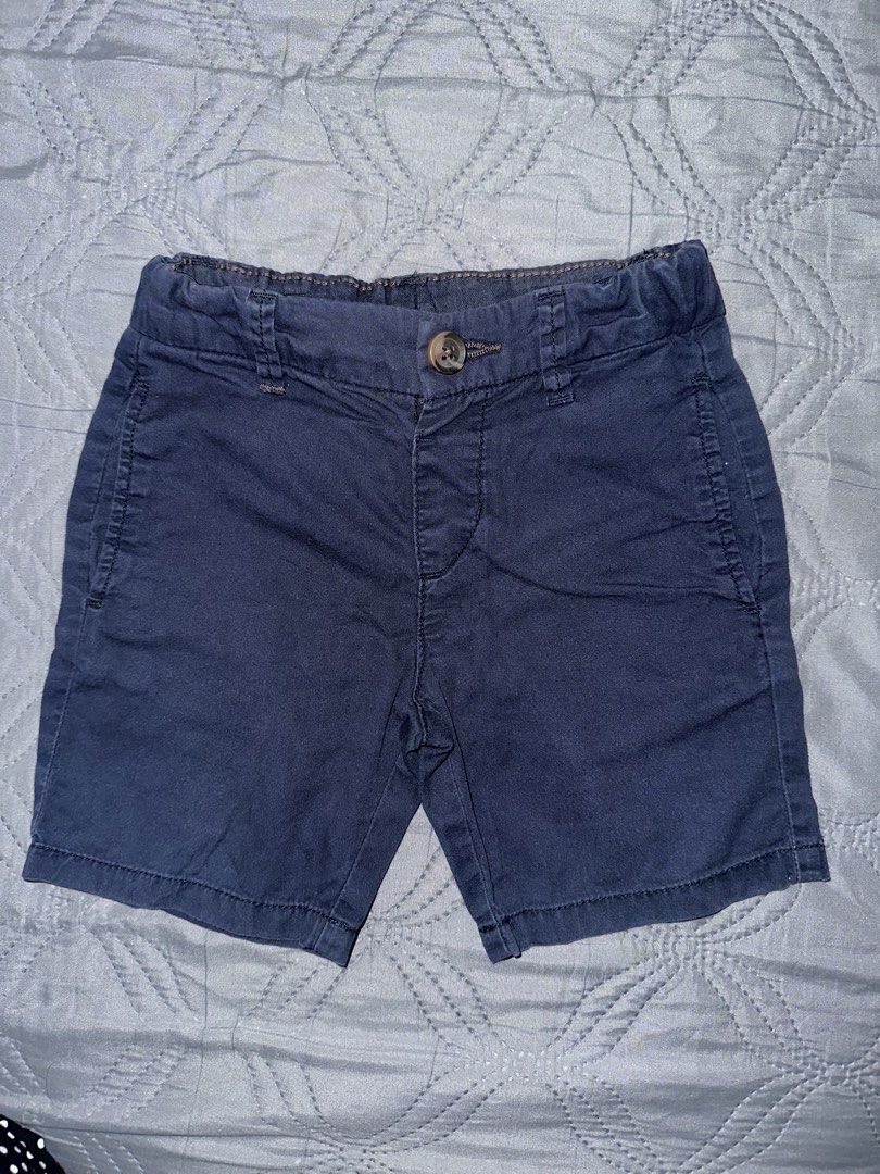 H&M Navy Blue Shorts 2T (Category: Babies & Kids Fashion) located in Bulacan. Submitted by dyna01 (Listing ID 1423846489, Image 1). Description: - H&M navy blue shorts - Size: 2T - Features: Elastic waistband, button closure, two front pockets - Material: Durable fabric - Ideal for active toddlers - Versatile for various outfits.
