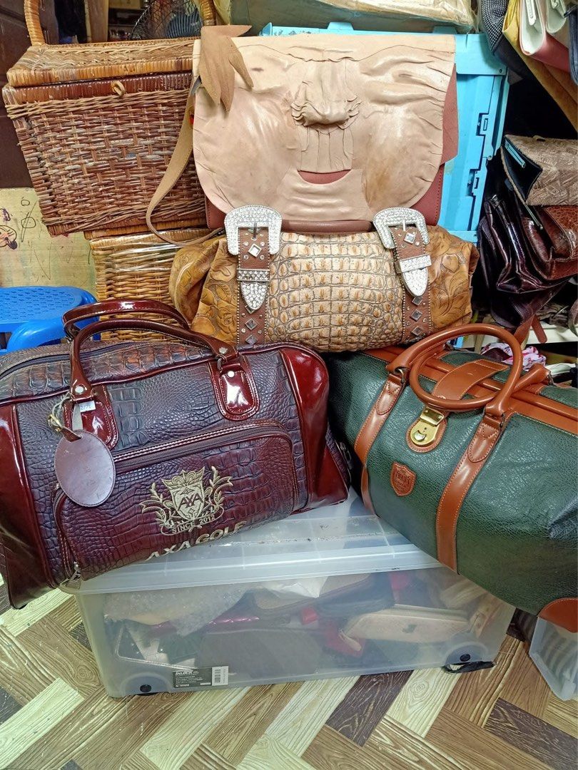 Japan Surplus Assorted Vintage Handbags (Category: Luxury Bags & Wallets) located in Caloocan City. Submitted by mzmarsz (Listing ID 1423901863, Image 1). Description: - Vintage handbag collection - Includes: - Burgundy crocodile-embossed bag with "AXA GOLF" logo - Green and brown duffel bag - Light brown leather bag with silver buckles - Woven basket - Materials: Leather or leather-like - as is.