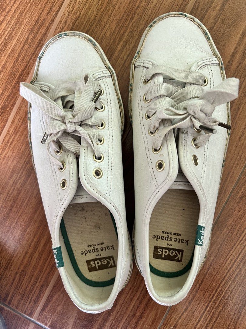 Keds for Kate Spade White Sneakers (Category: Sneakers) located in Cabanatuan. Submitted by happythriftbyshidshin (Listing ID 1423819440, Image 1). Description: - Kate Spade collaboration Keds - White leather upper - Gold eyelets - Gold spade logo on heel - Keds for Kate Spade New York insole branding - Size: US 7, UK 4.5, EUR 37.5, CM 24 - Comes with laces.