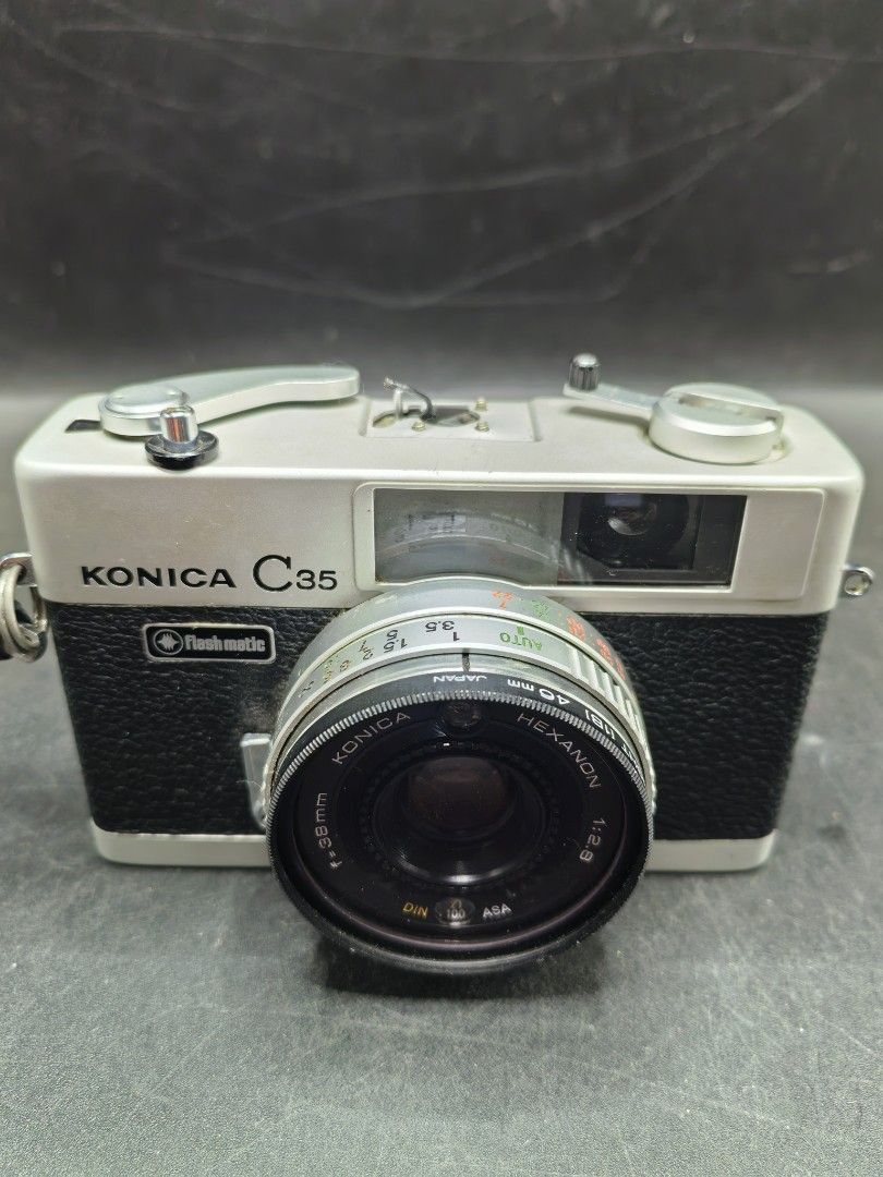 Konica C35 Flash-Matic Mechanical Camera (Category: Cameras) located in Cebu City. Submitted by dudes_villanueva (Listing ID 1423819942, Image 2). Description: Konica C35 Flash-Matic Mechanical Camera Condition: Functional Except for the Flash Visible issue on pic. Working Timer. LR44 Battery not included. All sales final and Non-refundable. 📌A vintage 35mm rangefinder camera featuring a Konica Hexanon 38mm f/2.8 lens. 📌Introduced around the la
