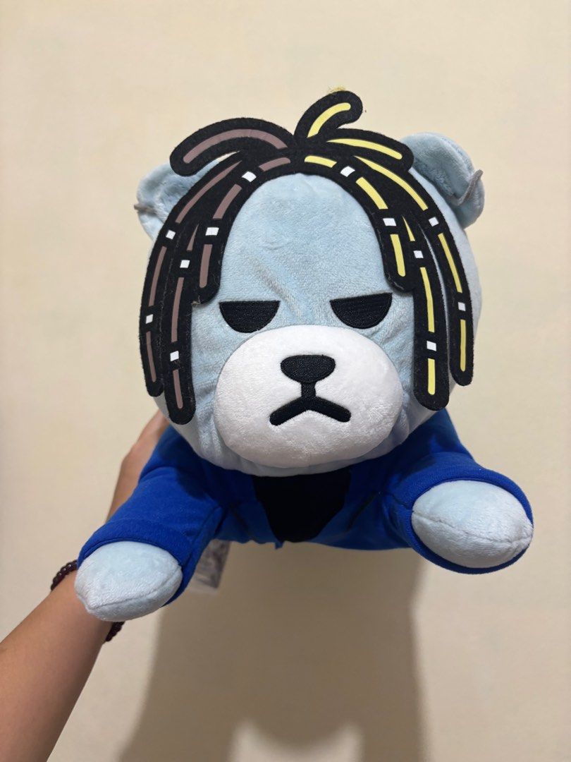 Krunk Bigbang Plush Toy Taeyang (Category: Plushies & Soft Toys) located in Muntinlupa City. Submitted by bbtrc (Listing ID 1423920941, Image 1). Description: - Krunk Bigbang plush toy Taeyang - Features a blue bear character - Wearing a blue jacket and jeans - Includes black shoes - Unique hairstyle - Comes with a tag - Perfect for Bigbang fans and collectors.