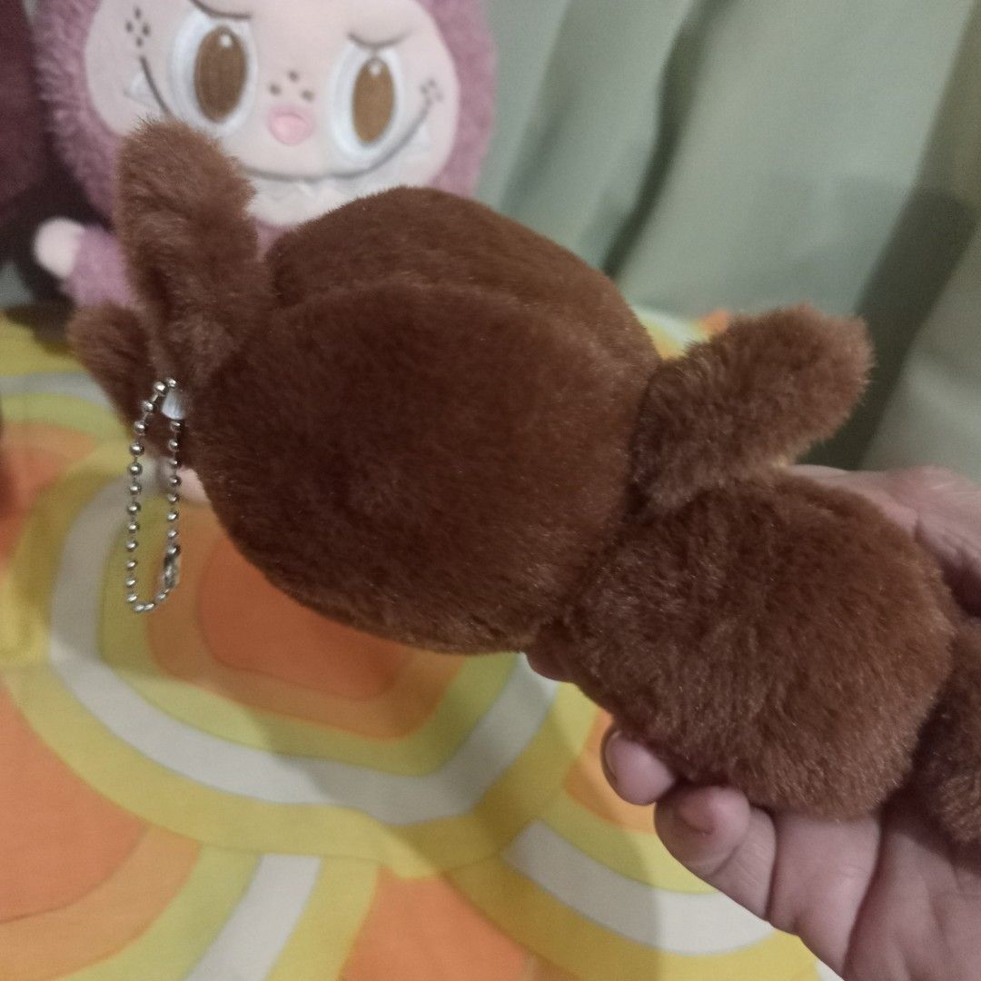 Labubu plush toy set (Category: Plushies & Soft Toys) located in Manila. Submitted by feg39 (Listing ID 1423841657, Image 2). Description: - Adorable plush toy set - Features a brown character: - Available with a guitar - Also available as a keychain - Includes a pink character with long ears - All toys have unique face designs - Perfect for collectors or gifts.