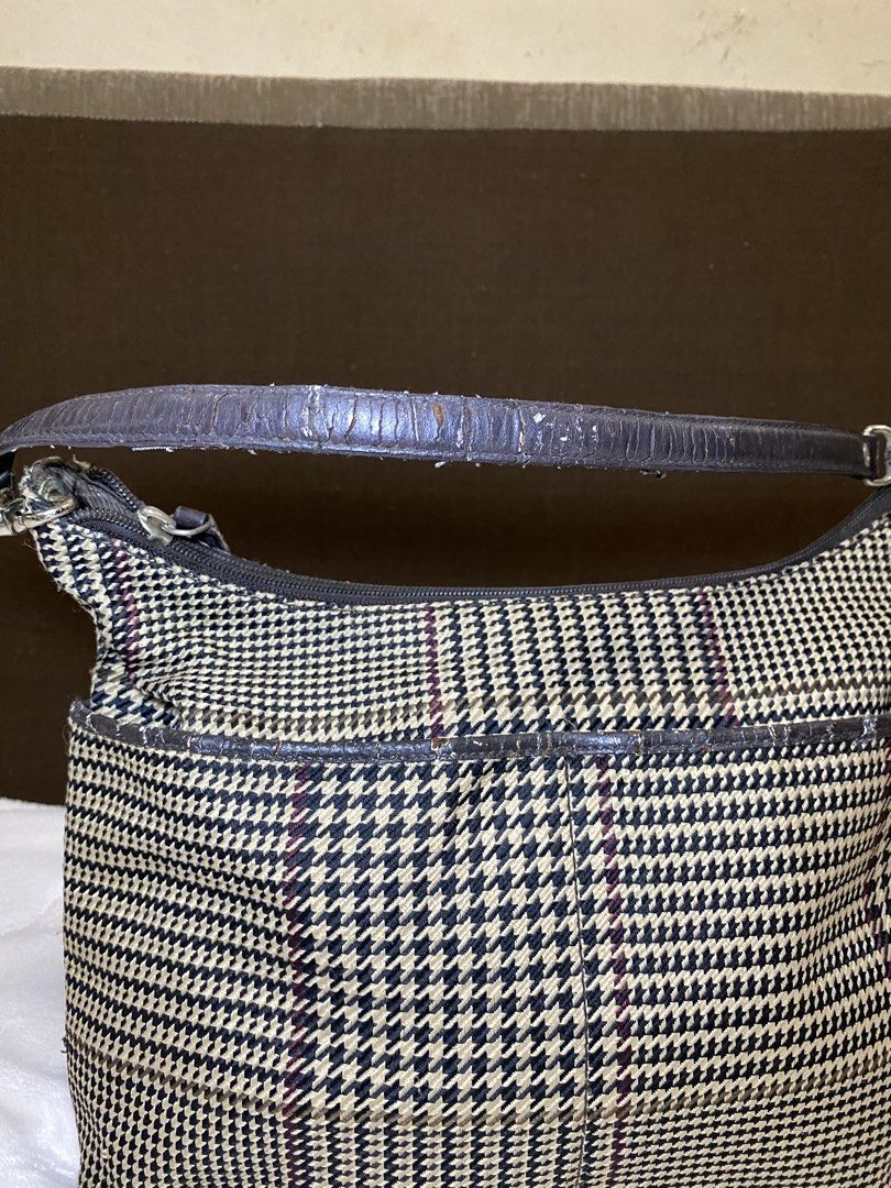 Lauren Ralph Lauren Houndstooth Shoulder Bag (Category: Luxury Bags & Wallets) located in San Antonio. Submitted by pixiechromzzz (Listing ID 1423927601, Image 3). Description: - Lauren Ralph Lauren shoulder bag - Houndstooth pattern - Zippered main compartment - Interior pocket - Brown leather trim - Shoulder strap - Brown interior lining - Handle shows wear RFS: NEEDS NEW OWNER ISSUE: LEATHER LININGS ARE CRACKED .