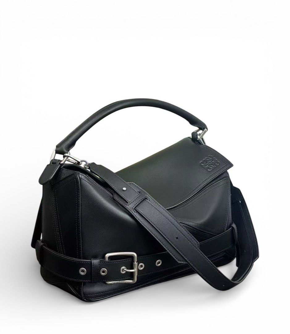 ⚜️Loewe Puzzle Bag Black Large (Category: Luxury Bags & Wallets) located in Makati City. Submitted by 90sangel (Listing ID 1423918431, Image 1). Description: •Item: Loewe Puzzle Biker bag in shiny calfskin. 🤎🕷️ •Size: large 33 x 21cm •Condition: Excellent! giftable! more detailed pictures, please DM Inclusions: Box, dustbag, paperbag, care card and loewe envelope from Loewe Japan. 🇯🇵🎌 .