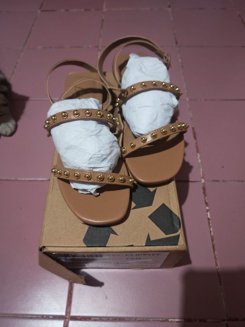 London Rag Flippity Sandals - Tan (Category: Flats & Sandals) located in Malabon City. Submitted by uniquexun (Listing ID 1423923854, Image 1). Description: - London Rag tan sandals - Size: 5US / 36EU - Features: - Round pin buckle fastening - Edgy stud embellishments - Comfortable low block heel - Open round toe - Comes with original box - Wrong size, never been used.