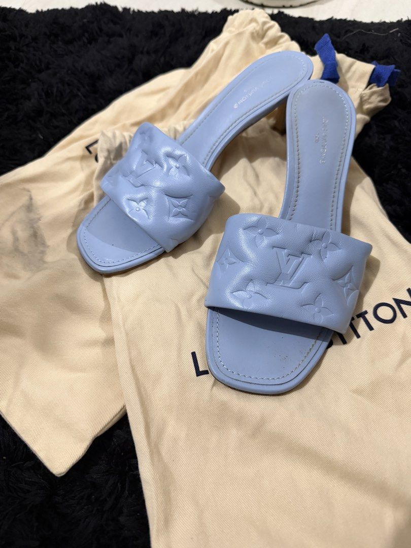 Louis Vuitton Monogram Sandals Size 36 (Category: Flats & Sandals) located in Cavite. Submitted by leinmark19 (Listing ID 1423796988, Image 3). Description: - Authentic Louis Vuitton sandals - Size 36 - Light blue color - Features the iconic monogram pattern - Includes dust bags, box and paper bag - Stylish for any occasion.