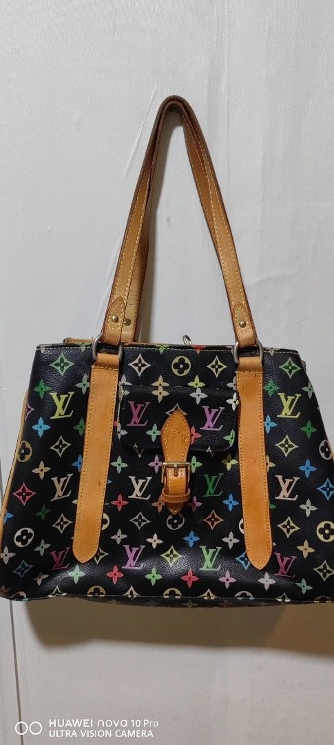 Louis Vuitton Multicolor Tote Bag (Category: Luxury Bags & Wallets) located in Bacolod City. Submitted by darriebags88 (Listing ID 1423968912, Image 1). Description: Louis Vuitton tote bag - Iconic multicolor monogram pattern - Black base with colorful LV logos - Tan leather handles and trim - Gray interior lining with zippered pocket - Buckle closure.
