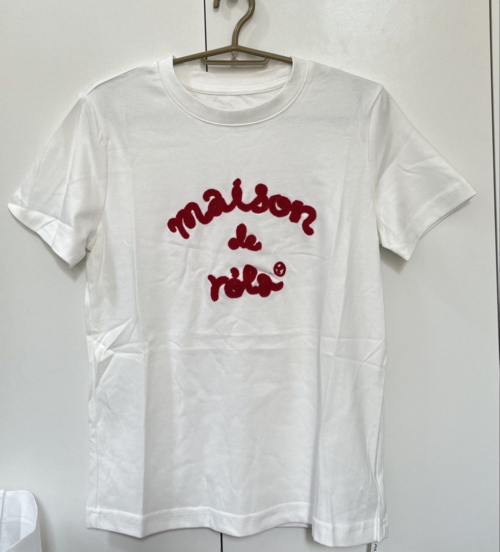 Maison de Rola White T-shirt (Category: Shirts) located in Angeles City. Submitted by emflores (Listing ID 1423810878, Image 1). Description: - White t-shirt - Features a red "maison de Rola" logo - Classic crew neck design - Comfortable short sleeves - Bought in Bangkok.