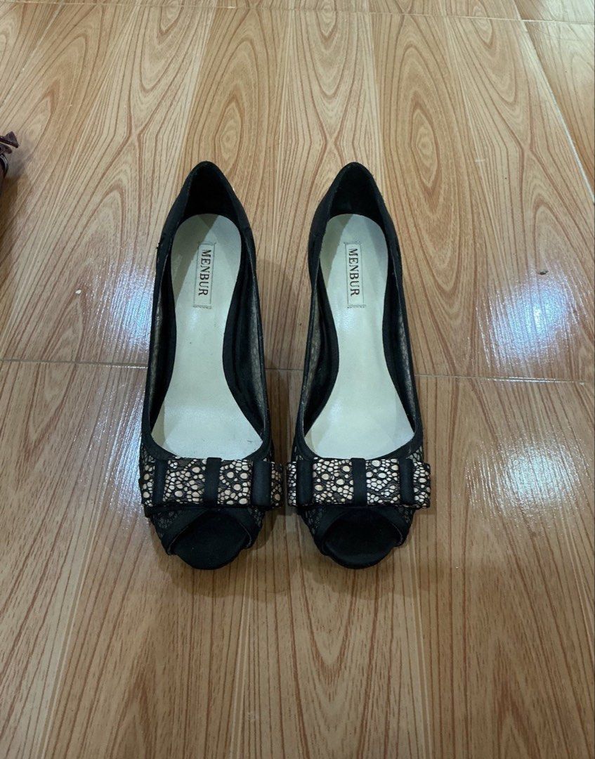 Menbur Black Heels with Bow Detail (Category: Heels) located in Dagupan City. Submitted by againandadorned (Listing ID 1423867682, Image 1). Description: - Menbur black peep-toe heels - Features a delicate bow embellishment - Satin-like finish - Sheer mesh detail on sides - Branded insole - Ideal for special events.